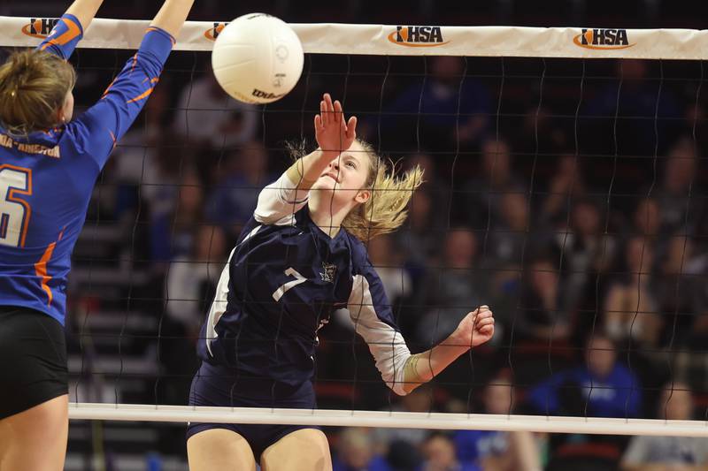 IC Catholic’s Delilah Hyland powers a shot against Genoa-Kingston in the Class 2A championship match on Saturday in Normal.