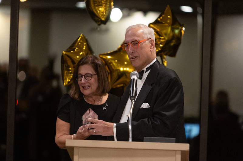 Scott Lebin awards the Wood Award to Martha Sanchez at the Geneva Chamber of Commerce Awards Dinner on Thursday, Nov. 6,2025 in Geneva.