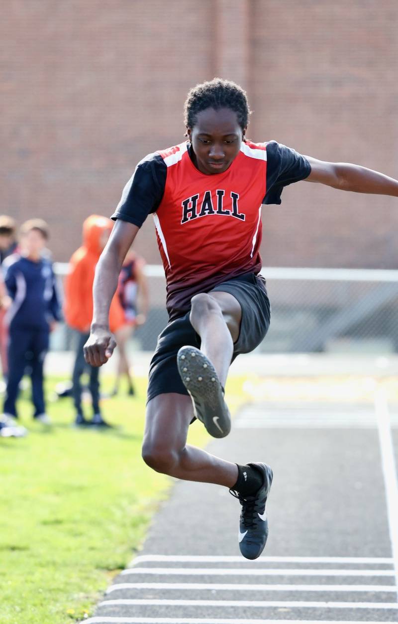 Bryan Smith jumps for Hall in the long jump in Tuesday's Howard-Monier Invite at Princeton.