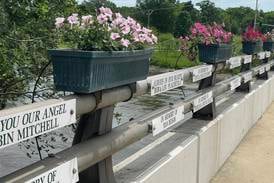 Honor a loved one with sign on Montgomery bridge