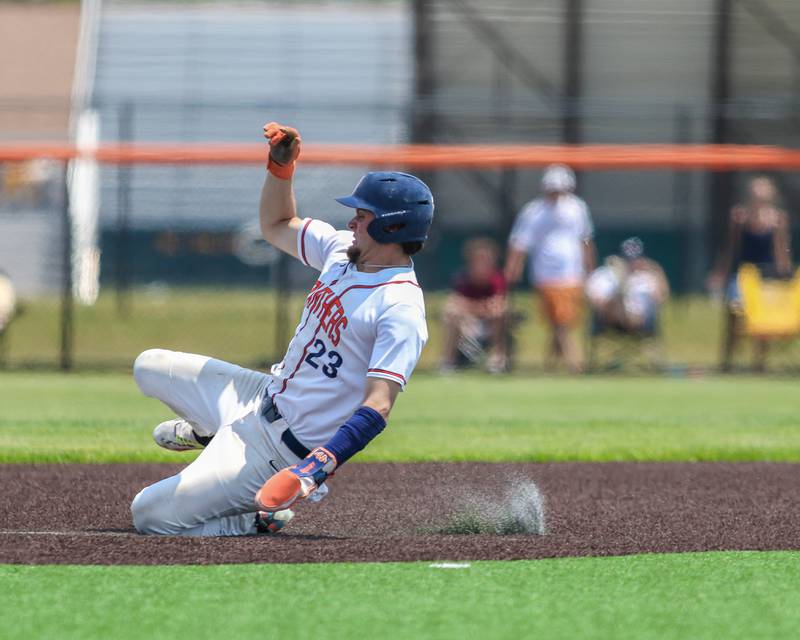 Oswego's Cade Duffin (23) slides into second during Class 4A Romeoville Sectional final game between Oswego East at Oswego.  June 3, 2023.