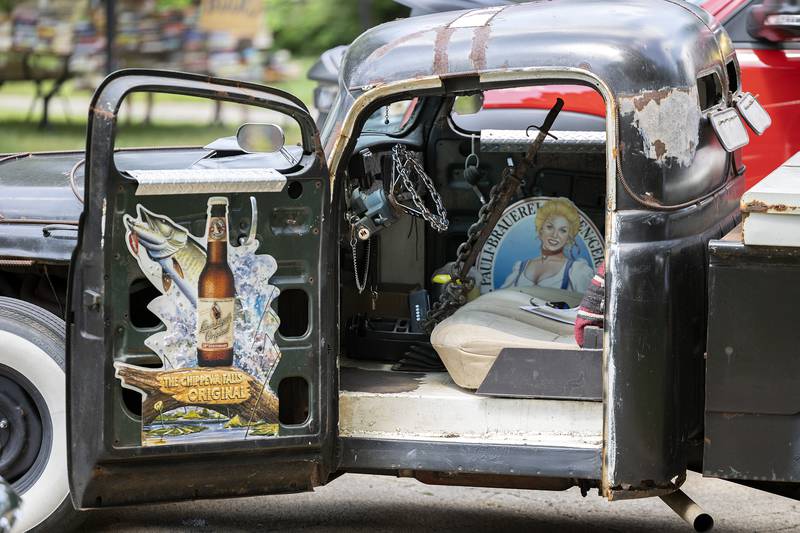 A rat rod with a unique interior is seen Monday, July 3, 2023 at John Dixon park at the annual Petunia Fest car show.