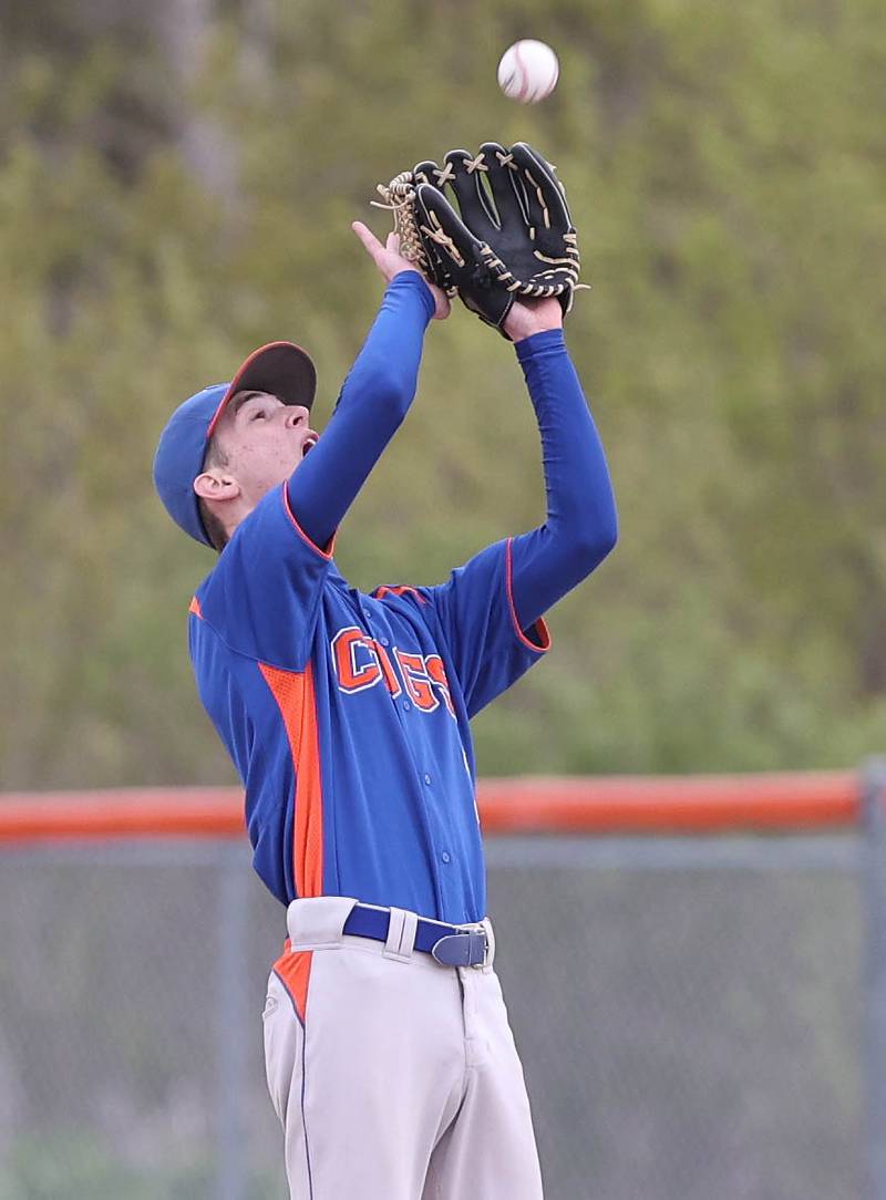 Genoa-Kingston's Connor Grimm takes the throw as Rockford Lutheran's Colin Courier comes in with a standup double during their game Tuesday, May 2, 2023, at Genoa-Kingston High School.