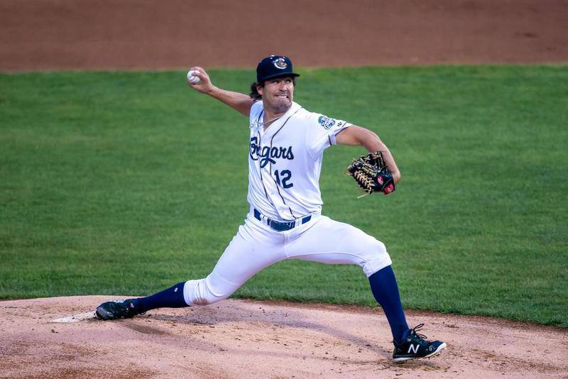 Kane County Cougars pitcher Jackson Goddard (12) delivers a pitch against the Beloit Snappers in Geneva June 27.