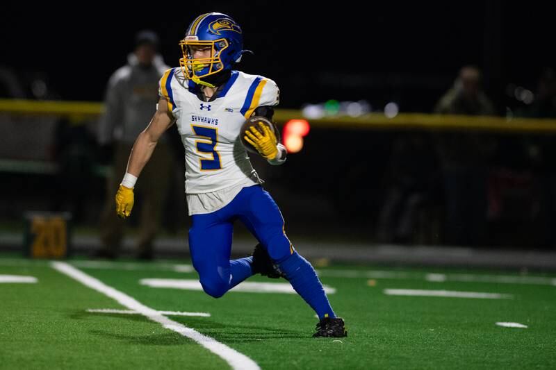 Johnsburg's Landon Johnson runs the ball during the first round IHSA class 4A playoffs against Coal City on Friday Nov. 1, 2024 at Coal City High School