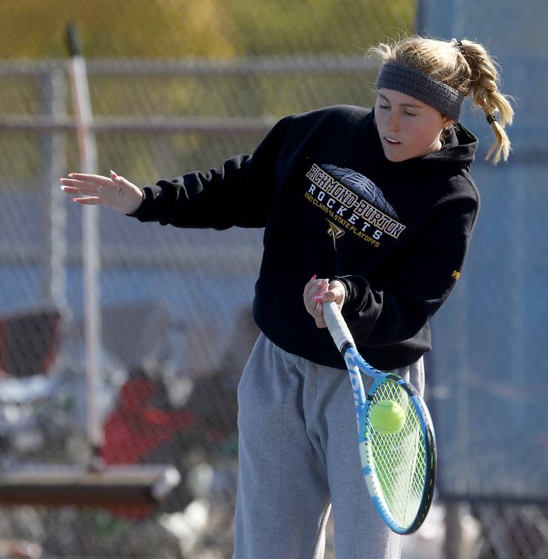 Richmond-Burton’s Savannah Webb returns the ball Thursday, Oct. 20, 2022, during during the first day of the IHSA State Girls Tennis Tournament at Hoffman Estates High School in Hoffman Estates.