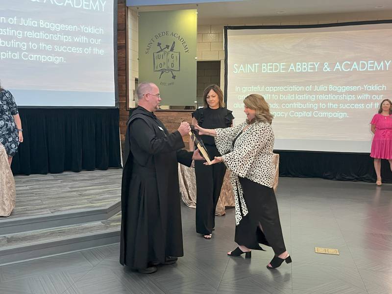 The 41st annual St. Bede Auction, held June 15, 2024, included a special recognition to Julia Baggesen-Yaklich, who served St. Bede as Director of Mission Advancement and Major Gifts before her retirement this past April. Julia’s successful 10-year career in the Development Department is highlighted with fundraising for the much-needed Academy renovations.