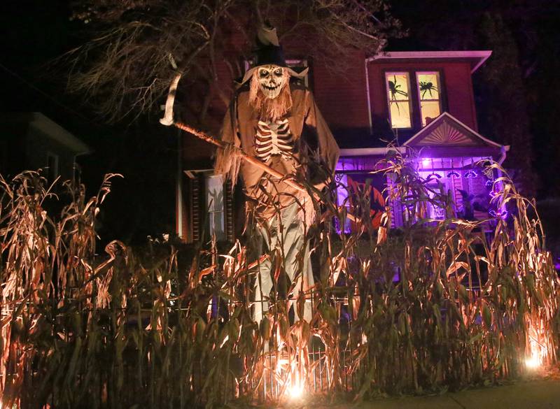 A large Halloween display features lots of skeltons in the 2400 block of Second Street on Monday, Oct. 27, 2025 in Peru.