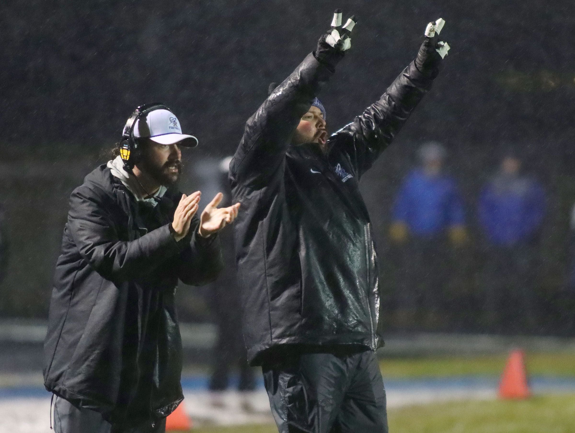 Burlington Central’s players and coaching staff react during win against Harlem in IHSA football Class 6A second-round playoff action at Central High School in Burlington on Saturday, November 8, 2025.