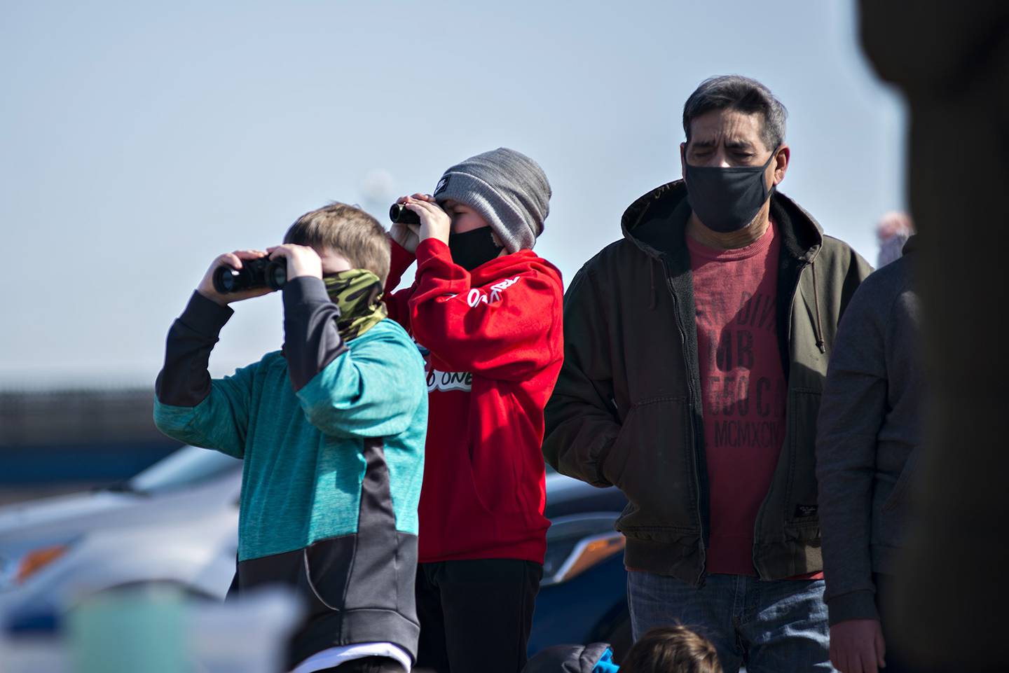 Carson Grove (left), 11, and Korbin Cooksey, 11, use binoculars to spot bald eagles Saturday during a program about the birds in Rock Falls.