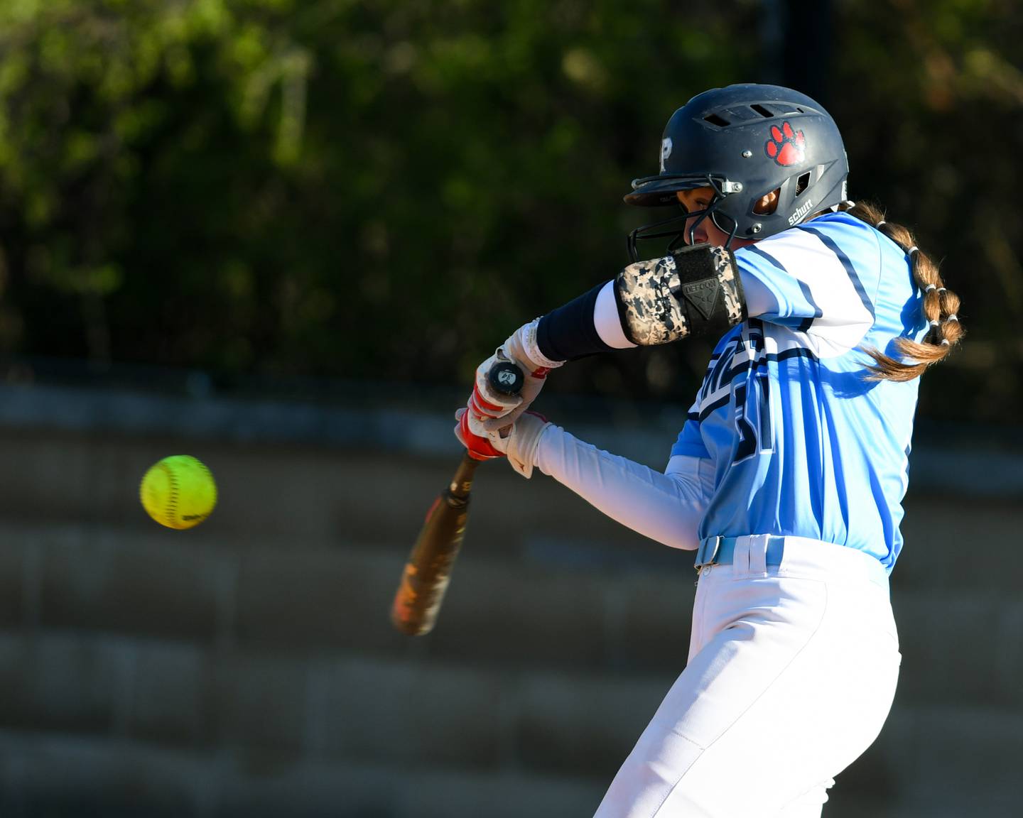 Lake Park's Kylie Pytlak (31) makes contact with the ball and makes it to first base during the game on Wednesday April 24, 2024, while taking on St. Charles North.