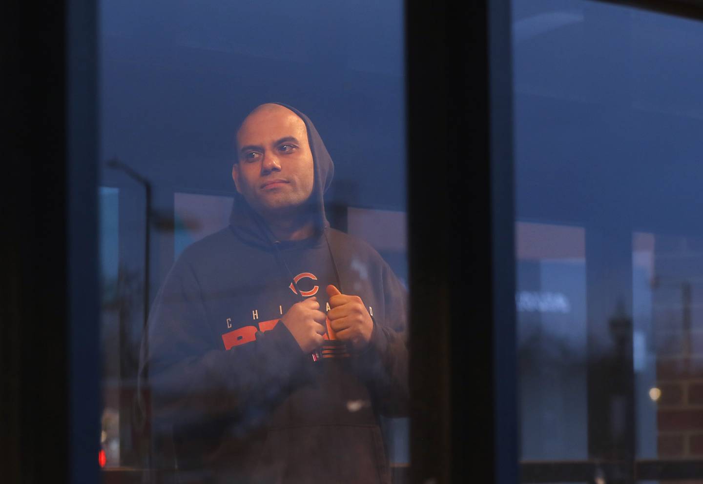 Julio Lozada of Woodstock waits for the Metra train to go to Chicago on Tuesday, Feb. 14, 2023, at the Crystal Lake Metra station in downtown Crystal Lake.