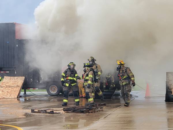 Up in smoke: Local firefighters participate in flashover simulations