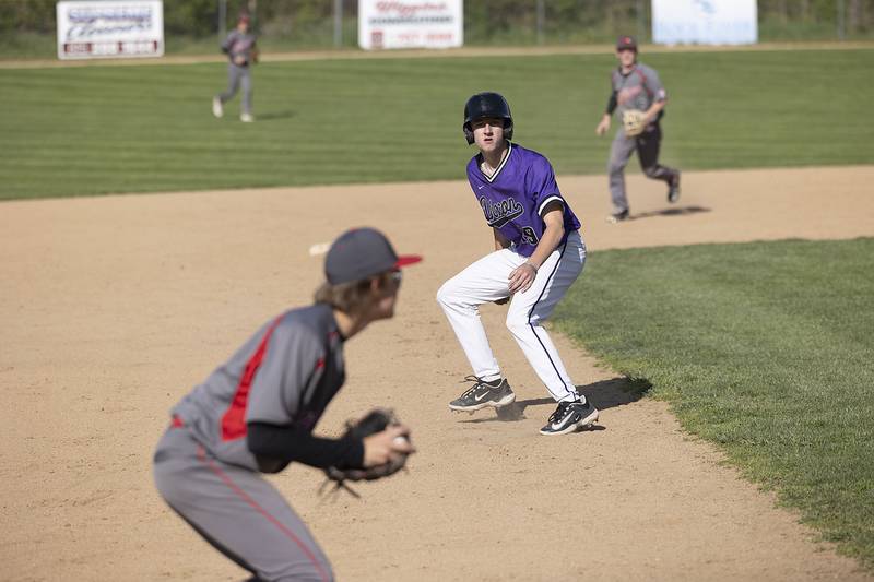 Dixon’s Collin Scott avoids being tagged out at third against Stillman Valley Thursday, April 27, 2023.