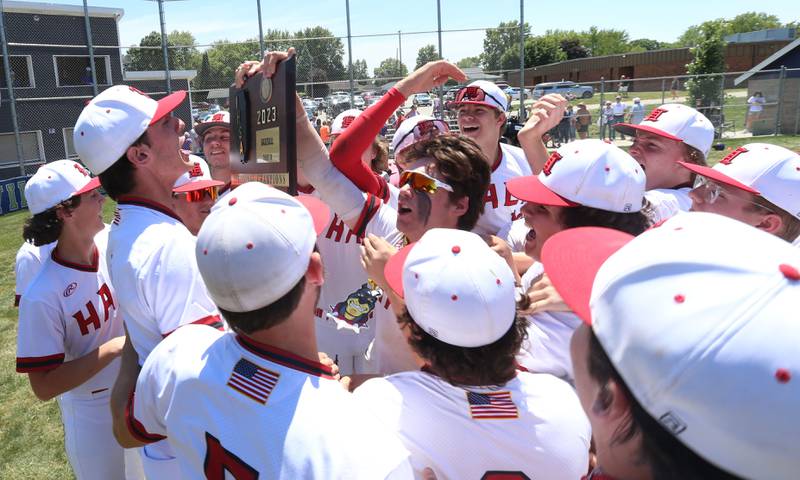 Members of the Hall baseball team celebrate after defeating Sherrard during the Class 2A Sectional final game on Saturday, May 27, 2023 at Knoxville High School.