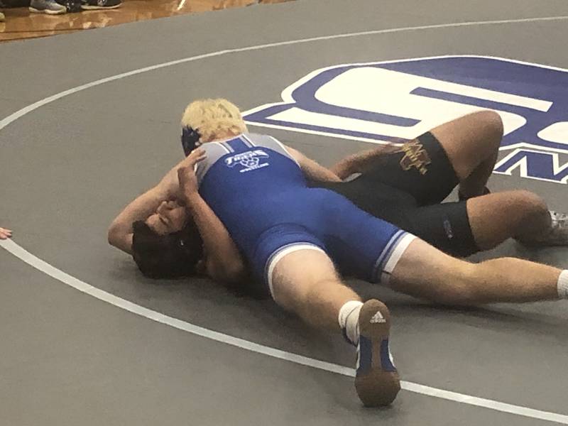 Princeton's Ian Morris scores a pin at 195 Tuesday at Prouty Gym over Morris.