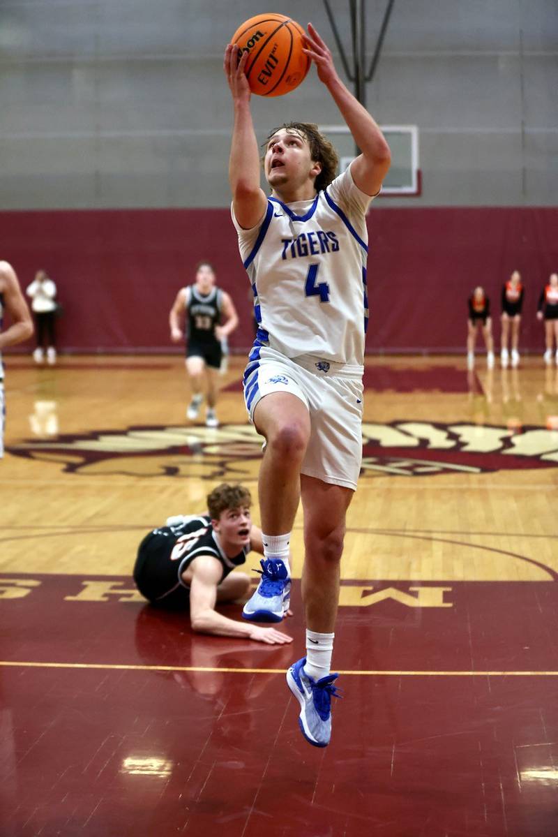 Princeton's Jayden Fulkerson makes a key layup late in Wednesday's sectional semifinals at Marengo. Princeton beat Byron 46-42 to advance to Friday's championship against Rock Falls.