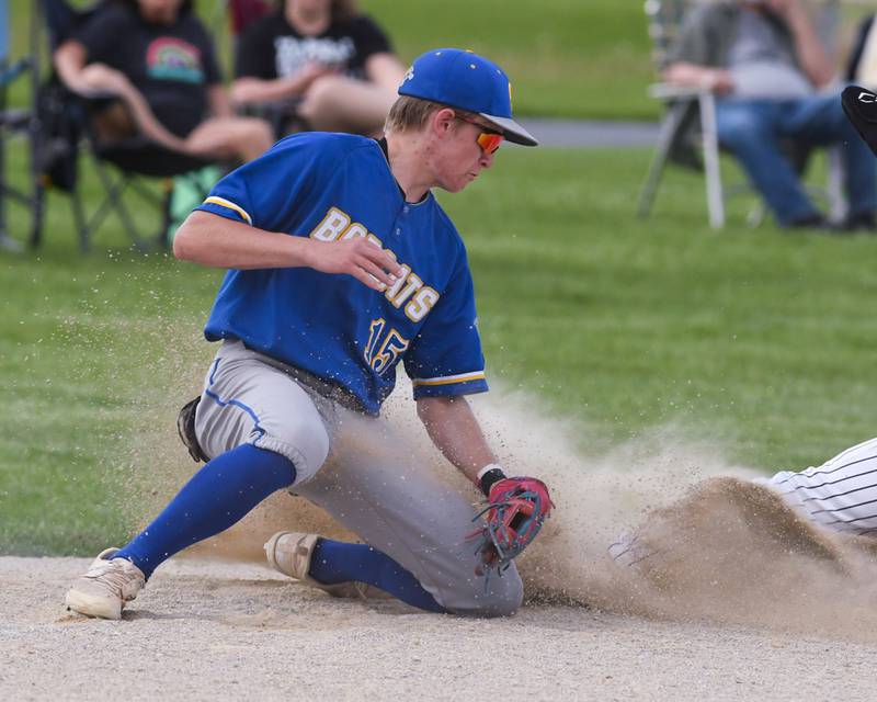 Somonauk's Luke Hartsell (15) tries to tag out the base runner during the game on Tuesday May 13, 2025, held at Somonauk High School.