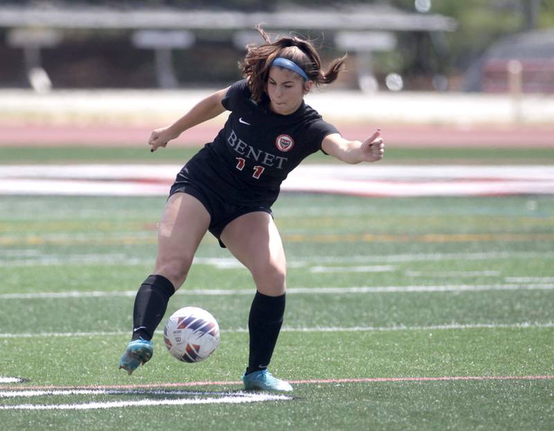 Benet’s Gabi Dimatteo kicks the ball during a Class 2A girls state soccer semifinal against Crystal Lake Central at North Central College in Naperville on Friday, June 2, 2023.