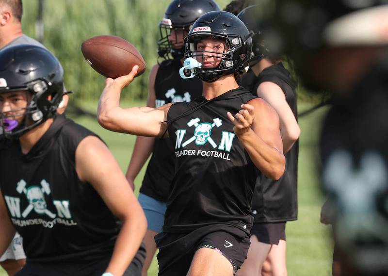 Woodstock North’s Parker Halihan throws a pass Tuesday, July 16, 2024, during their matchup with DeKalb in the Kaneland 7-on-7 at the school in Maple Park.
