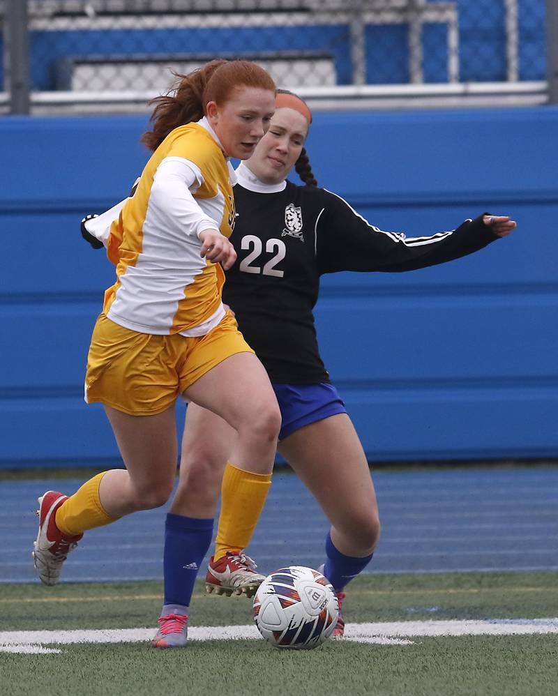 Jacobs' Delaney Lukowski tries to control the ball in front of Lake Zurich’s Brianna Oberfield during a nonconference girls soccer match Tuesday, April 4, 2023, at Lake Zurich High School.