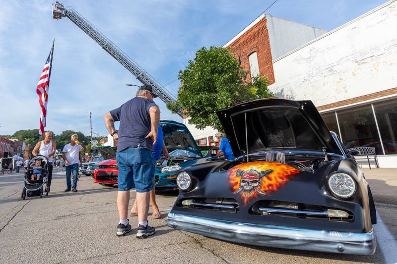 Residents attend the 20th annual Cruise Night on Friday, August 8, 2025 on Main Street in Marseilles.