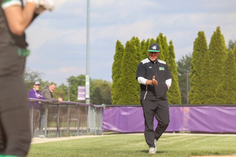 Seneca head coach Brian Holman communicates to a batter during Seneca's 11-1 victory over Manteno on Friday, May 8, 2026.