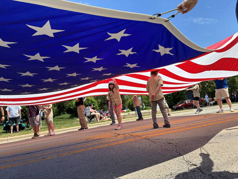 Boy Scouts from Crystal Lake Troop 194 and the Moose Club walked this large flag through the Crystal Lake Memorial Day Parade on Monday, May 25, 2026.