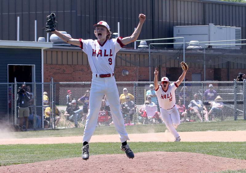 Hall's Izzaq Zrust reacts with third baseman Payton Dye after the final out against Sherrard during the Class 2A Sectional final game on Saturday, May 27, 2023 at Knoxville High School.