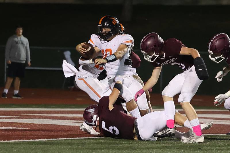 Lincoln-Way West’s Chase Hetfleisch runs in for the touchdown in overtime against Lockport on Friday, Oct. 18, 2024 in Lockport.