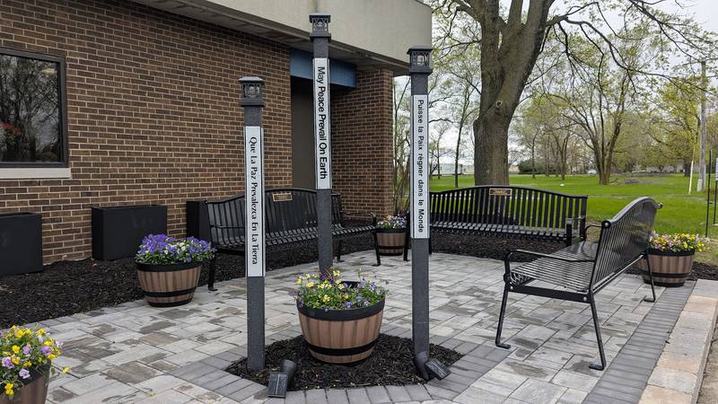 The Universalist Unitarian Church of Joliet’'s renovated peace pole garden is seen on Monday, April 21, 2025 in Joliet. A rededication ceremony for the peace pole garden will be held Sunday.