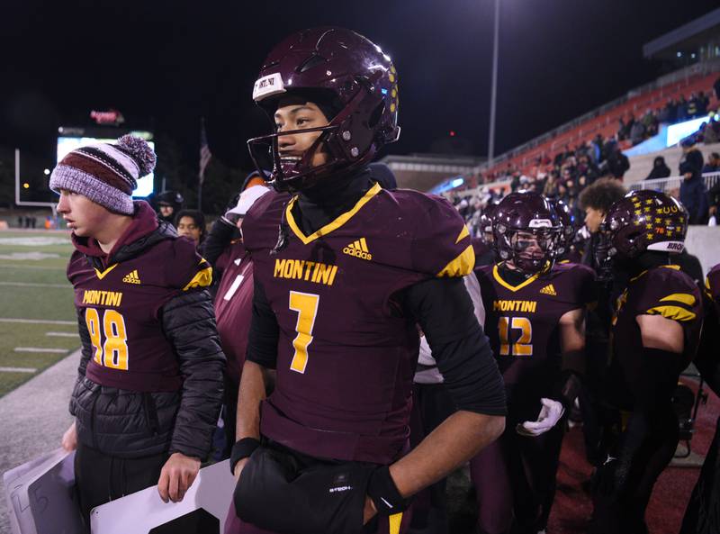 With his team on defense, Montini quarterback Israel Abrams watches as time winds down during the Broncos’ 47-33 victory over Rochester during the IHSA Class 4A state championship game on Friday, Nov. 28, 2025 in Normal. Montini did get back on offense before the game ended and took a knee to run out the clock.