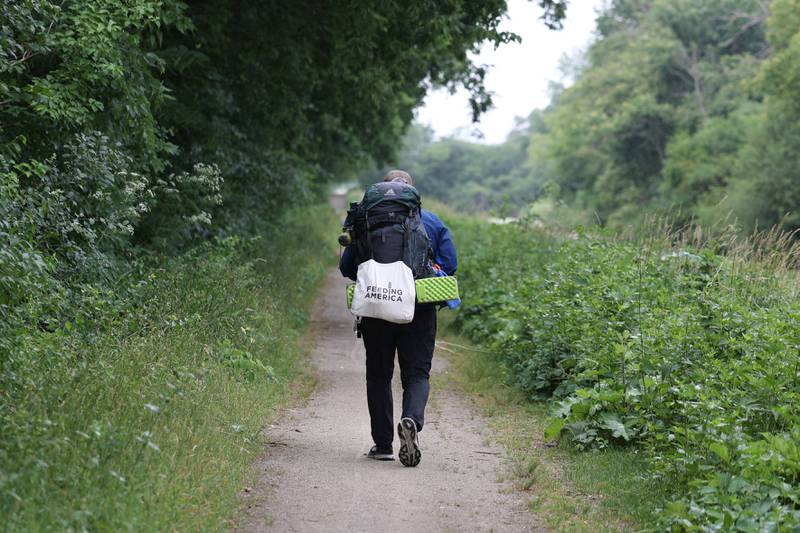 Feeding America supporter Brian Christner continues his walk across American with the 61 mile I&M Canal State Trail on Tuesday, June 13, 2023 in Joliet. Brian started his fundraising journey in Delaware on February 19th and expects to finish outside San Francisco in December.