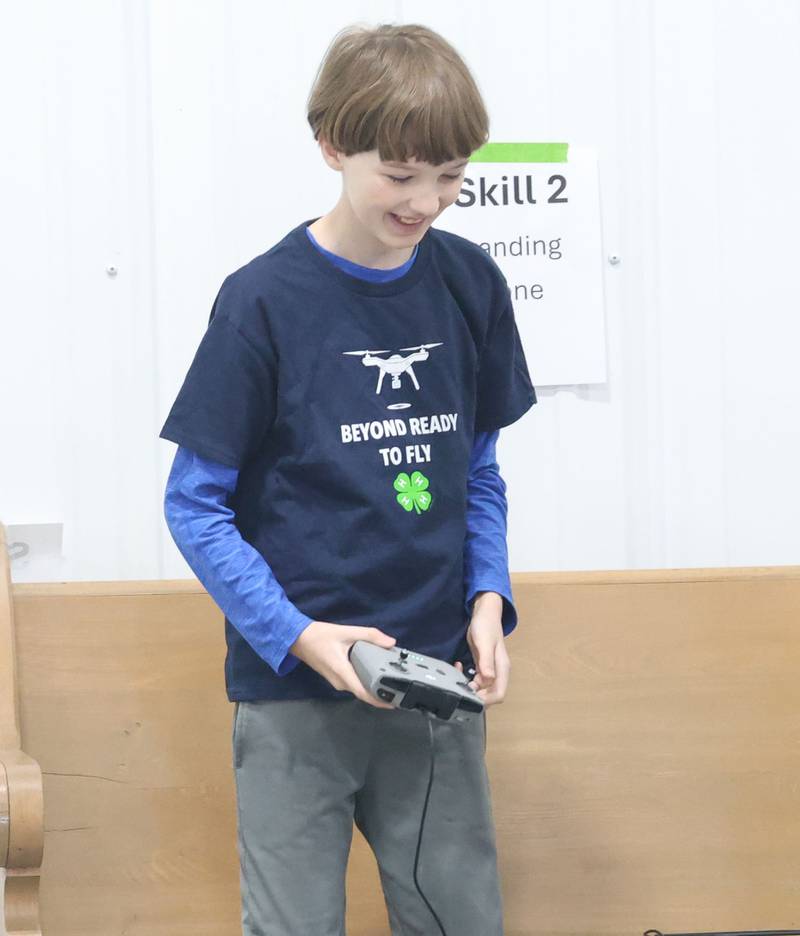 Ian Munn of Princeton, reacts after landing a drone competition on Saturday, Nov. 22, 2025 at the Second Story Teen Center in Princeton. Teams from Bureau, La Salle and Marshall-Putnam counties came together to showcase their flying skills during the event. Second Story Teen Center partnered with the University of Illinois Extension of Bureau, La Salle Marshall and Putnam Counties. Drones and awards were purchased through a grant and donations from Compeer Financial.