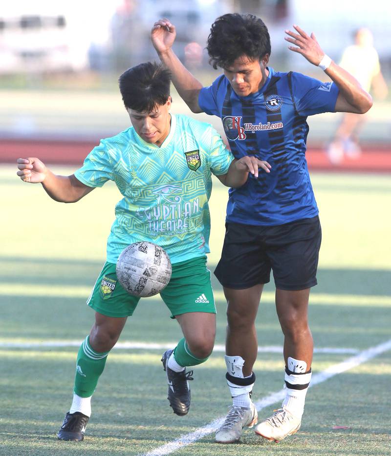DeKalb County United's Austin Montejano holds off Rockford FC's Poe Rae Wednesday, July 13, 2022, as the teams battle for the 815 Cup at the Northern Illinois University Soccer and Track and Field complex in DeKalb.