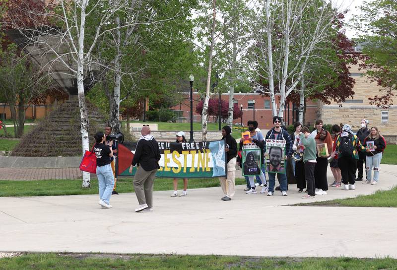 A group of about twenty demonstrators begin a march from the MLK Commons at Northern Illinois University Monday, April 29, 2024, to protest the Israel-Hamas War.