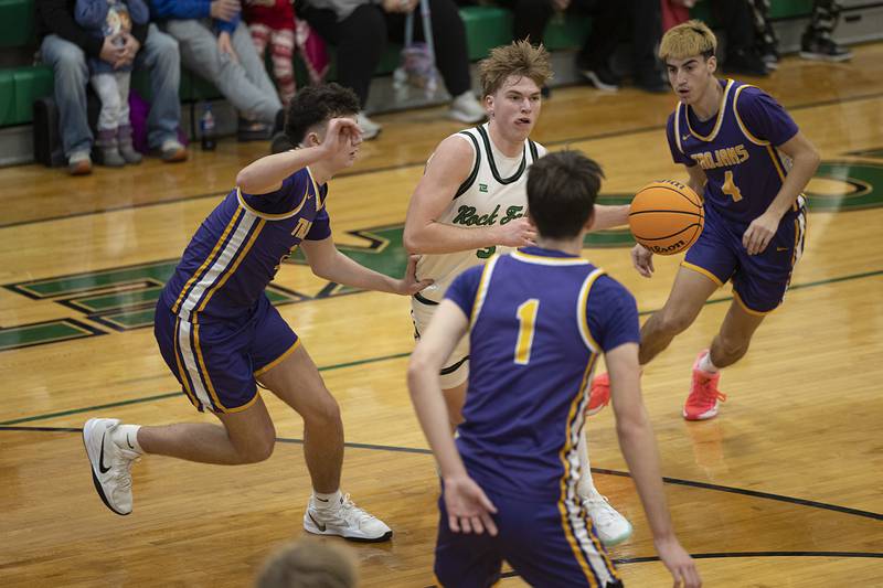 Rock Falls’ Cole Heald handles the ball in traffic against Mendota Monday, Dec. 15, 2025.
