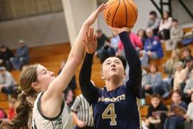 Photos: Marquette falls to Midland in girls basketball