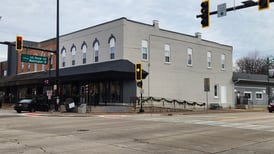Oswego grants variance to allow downtown building owner to paint rest of brick building