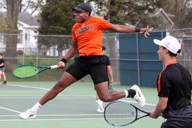 Photos: DeKalb, Sycamore boys tennis teams meet on courts