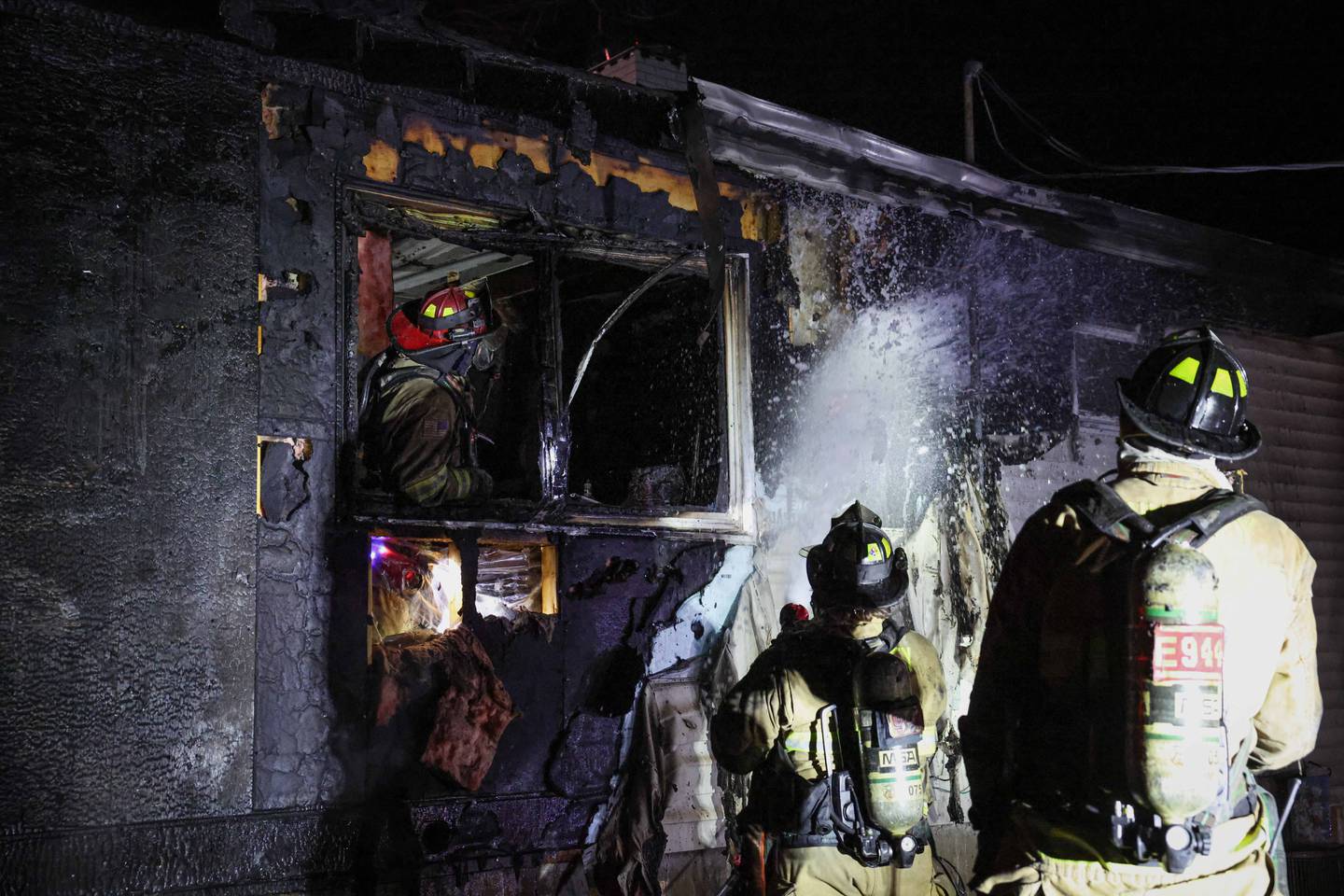 The Huntley Fire Protection District extinguishes a fire that destroyed a home on Feb. 23, 2026 at the 10600 block of Kathleen Avenue.
