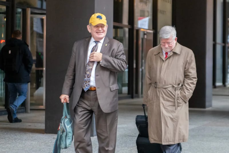 Mike McClain, left, with his attorney Patrick Cotter