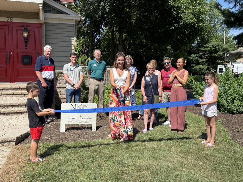 The Geneva Chamber of Commerce celebrating N&T-Alternative Medicine's grand opening