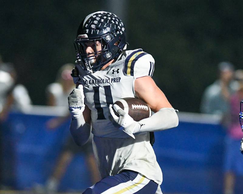 IC Catholic Prep's Grant Bowen (11) runs for a touchdown during the game on Friday Oct. 3, 2025, held at St. Francis High School.