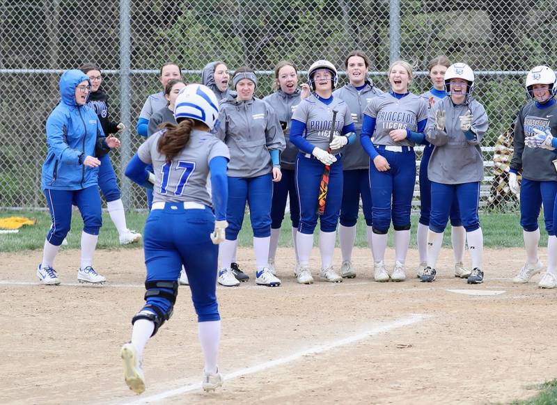 Princeton senior Isa Ibarra receives a welcoming party at home after slamming a three-run homer Tuesday at Mendota.