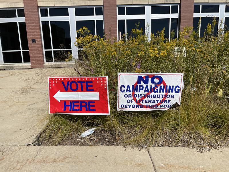Voting signs located outside of the McHenry County Administration Building on Thursday, Sept. 29, 2022. Thursday was the first day voters could cast their ballots in Illinois and McHenry County.