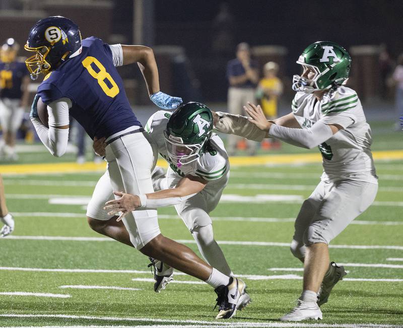 Sterling’s Koby Bell looks to make a move against Alleman Friday, Oct. 3, 2025.
