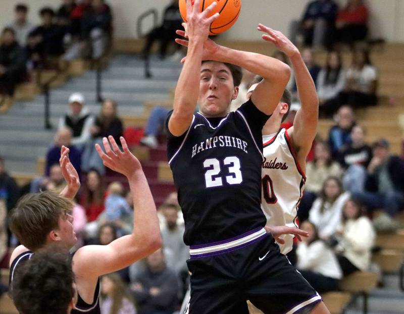 Hampshire’s  Sean Roth snags a rebound in varsity boys basketball on Friday, Dec. 19, 2025, at Huntley High School in Huntley.