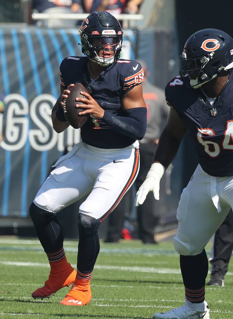 Chicago Bears quarterback Justin Fields looks for a receiver during their game against the Denver Broncos Sunday, Oct. 1, 2023, at Soldier Field in Chicago.