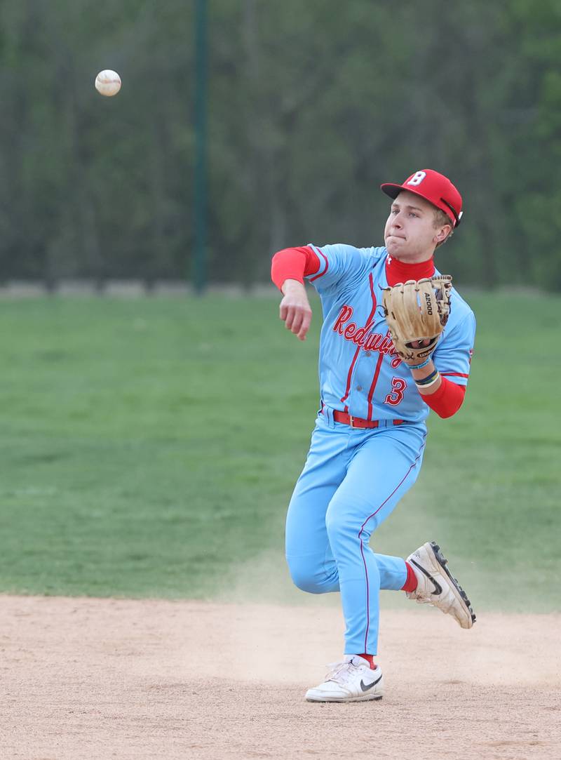 Benet's Cole Rosenthal (3) makes a play during the varsity baseball game between Benet Academy and Nazareth Academy in La Grange Park on Monday, April 24, 2023.